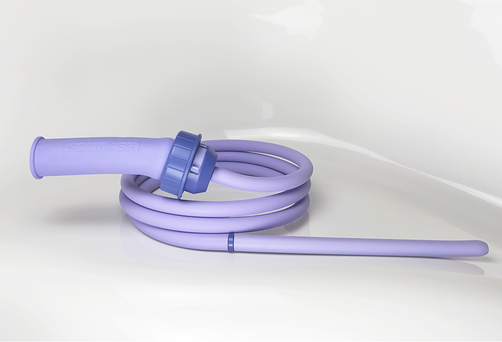 Purple flexible silicone Squwash shower douche coiled on a white background.
